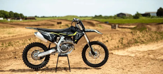 Triumph’s 2027 TF 250-X Update Is a Championship Parts Invoice, Not a Power Grab