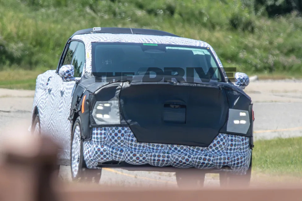 Spied: Ford’s $30,000 Electric Truck Caught Next to an Expedition