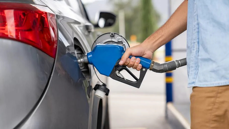 What Does That Little Latch on a Gas Pump Nozzle Actually Do?