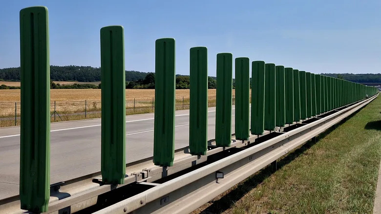 What Are The Green Things On Highway Dividers For?