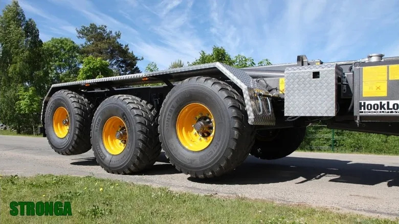 Why Do Some Semi-Trucks Have An Axle Lifted Off The Ground?