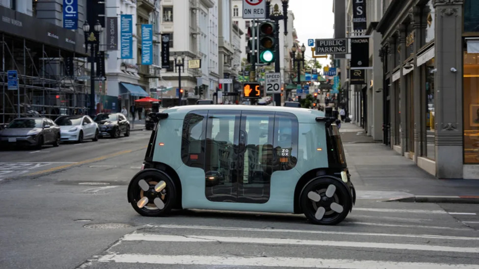 Robotaxi, Amazon's Zoox Is The First Steering Wheel-Free Robotaxi To Get Regulatory Approval For Paid Rides