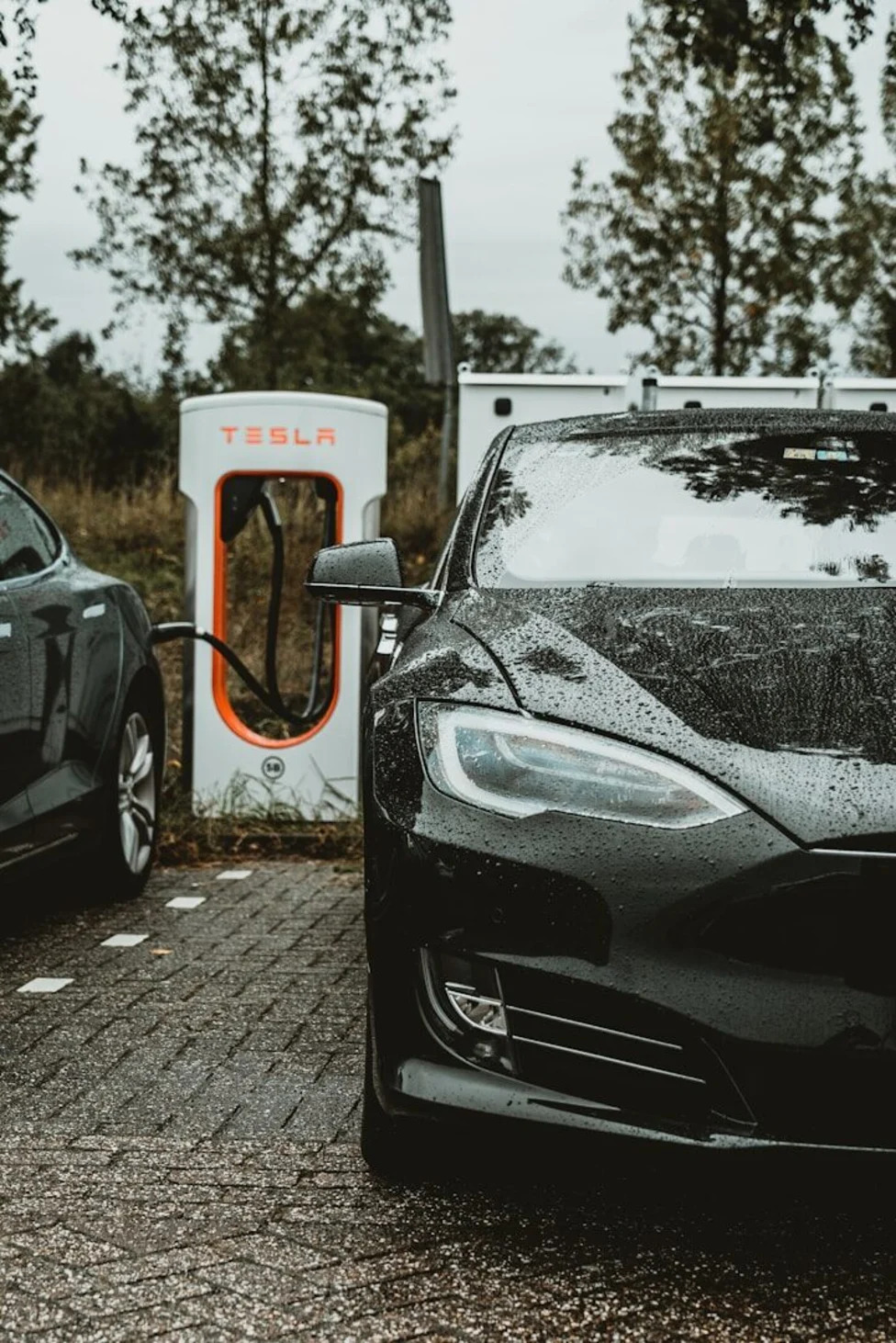 Inside Tesla's 64-Stall Queens Supercharger: Power, Utility Costs and Rideshare Demand