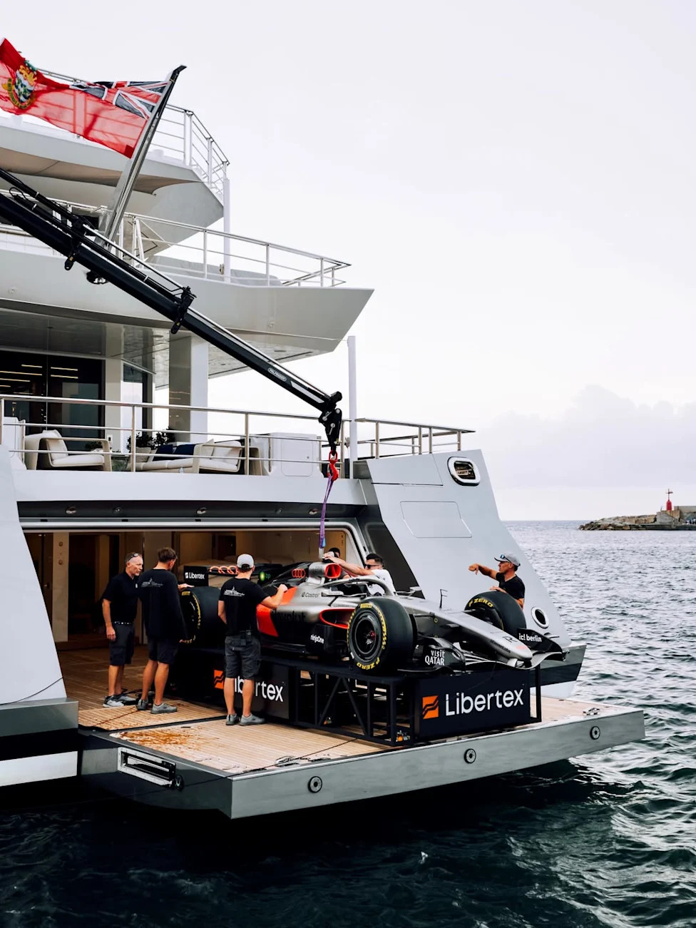 Koenigsegg, Someone Craned a Koenigsegg and an F1 Car Onto a $75 Million Yacht, Because Monaco