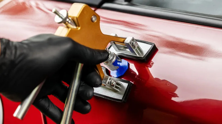 Can You Really Fix Car Dents With Cheap Cans Of Compressed Air? (And Should You?)