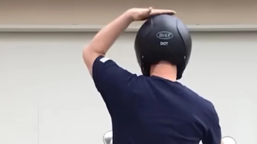 What Does It Mean When A Motorcyclist Taps The Top Of Their Helmet?