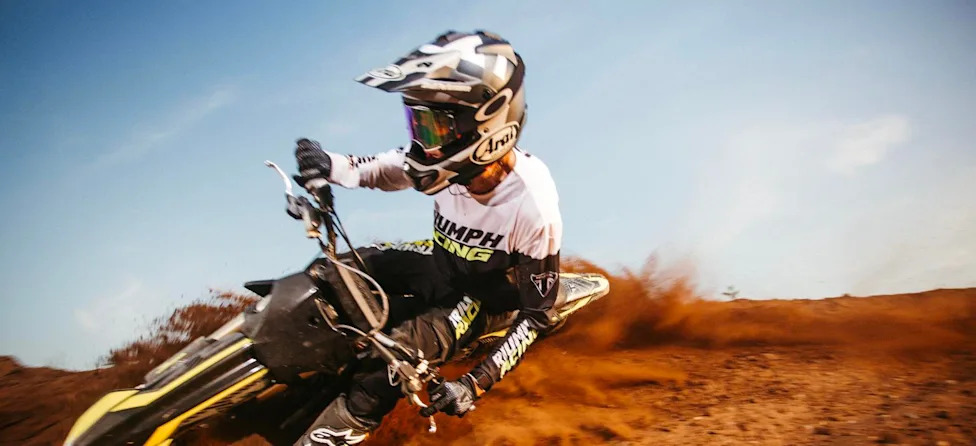 Triumph’s 2027 TF 250-X Update Is a Championship Parts Invoice, Not a Power Grab