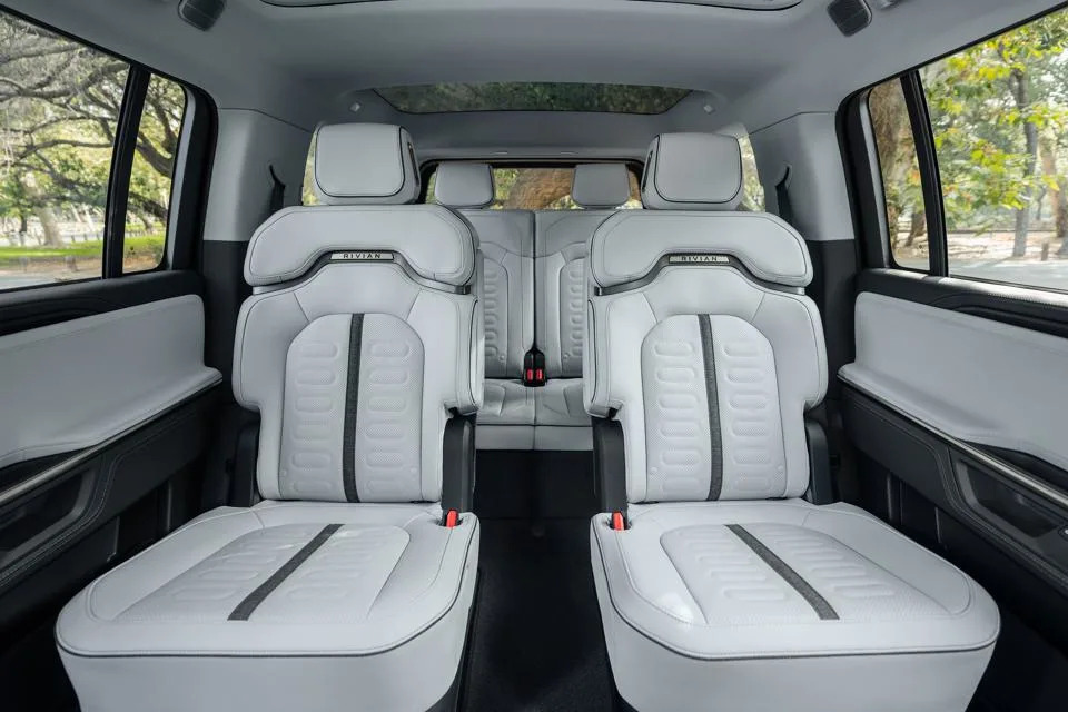 Rivian Updates Its 2027 R1 Lineup With New Color, R1S Captain’s Chairs