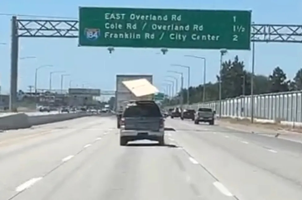 Crazy Video Shows Plywood on Roof Takes Flight at Highway Speed, and the Driver Has No Idea