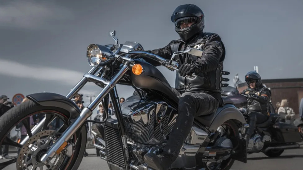 What Does It Mean When A Biker Has Their Left Palm Facing Up And Swings It Upwards?