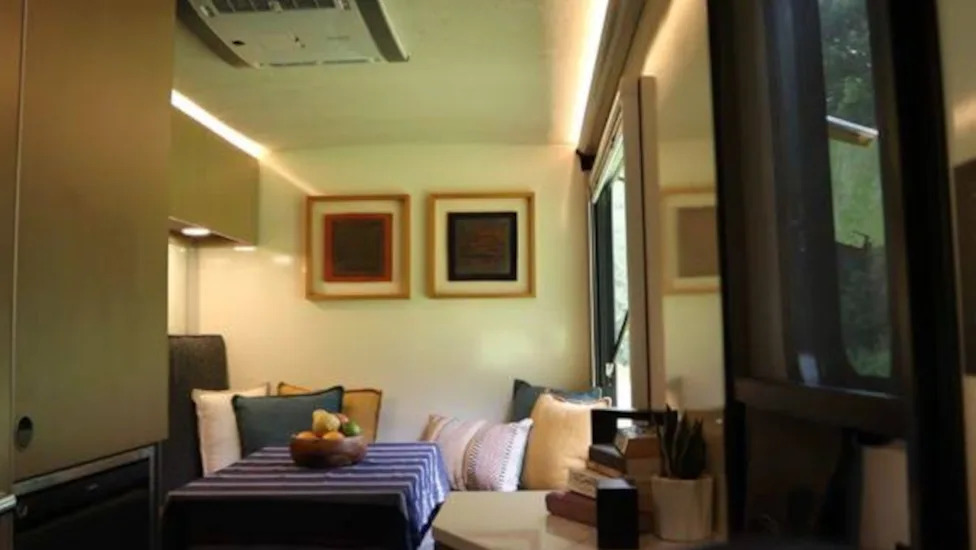 This humble trailer is the TARDIS of campers – even has a bath and full-sized kitchen