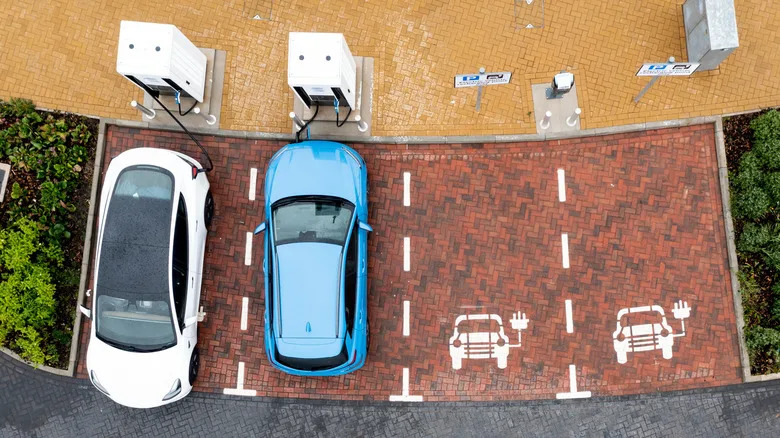 Is Parking A Gas Car In An EV Charging Spot Illegal? It's Complicated