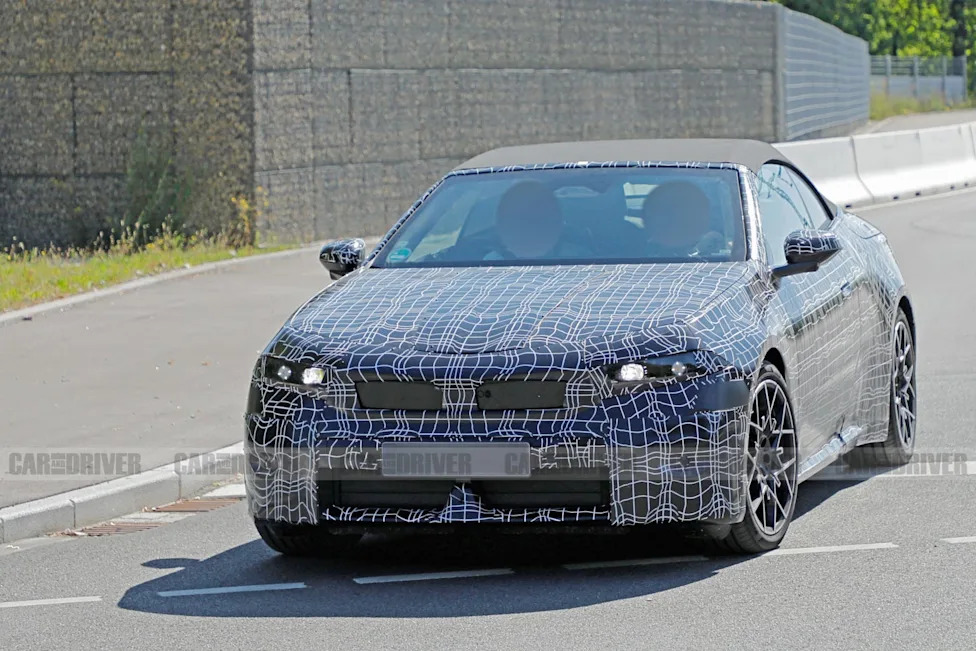 BMW's Rumored i4 Convertible Finally Spotted Testing with Soft Top and Neue Klasse Styling