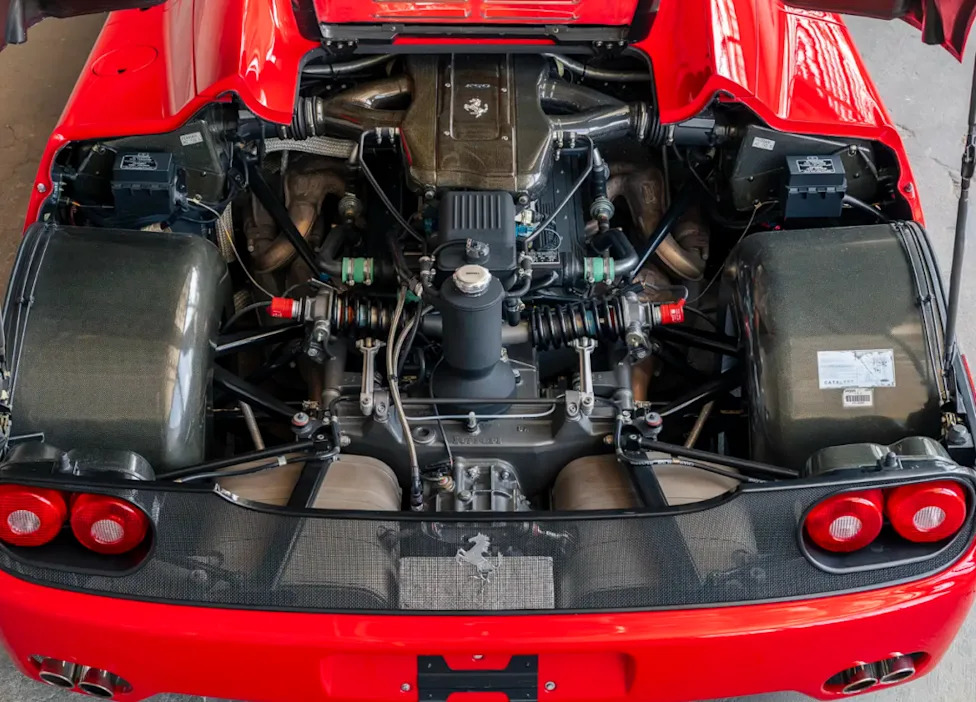 Mike Tyson’s 202-MPH Ferrari F50 Heads to Auction—Signed Boxing Gloves Included