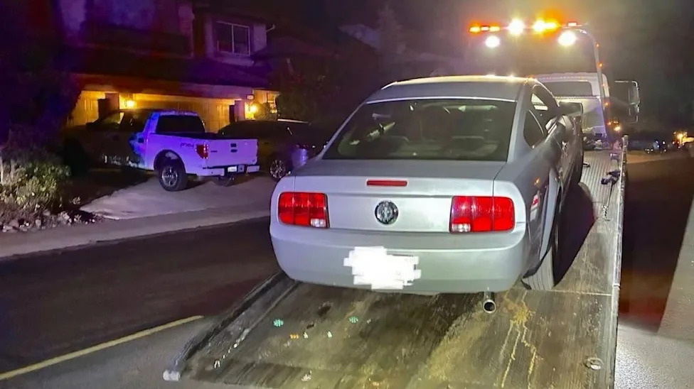 2 Ford Mustang Drivers Allegedly Picked the Worst Possible Place to Street Race: In Front of a Cop Car