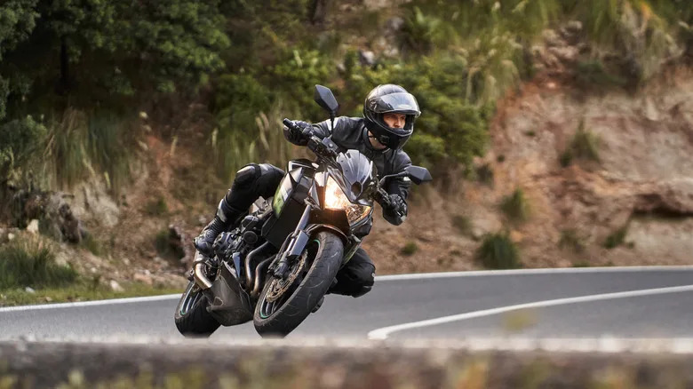 Why Do Bikers Lean Sideways Around A Turn?