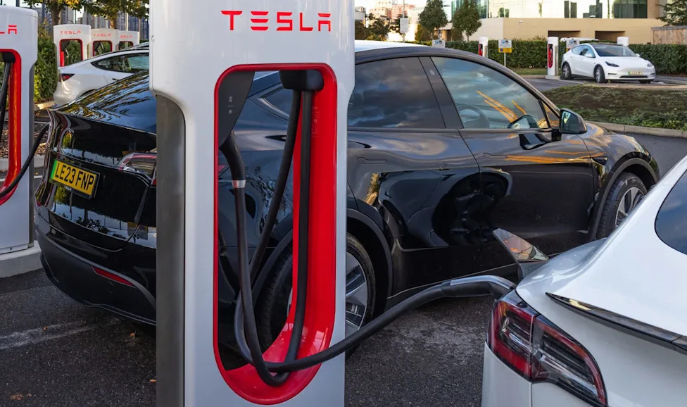 Tesla, Driver opens Tesla app at packed Supercharger station to discover new feature that even non-Tesla owners can use