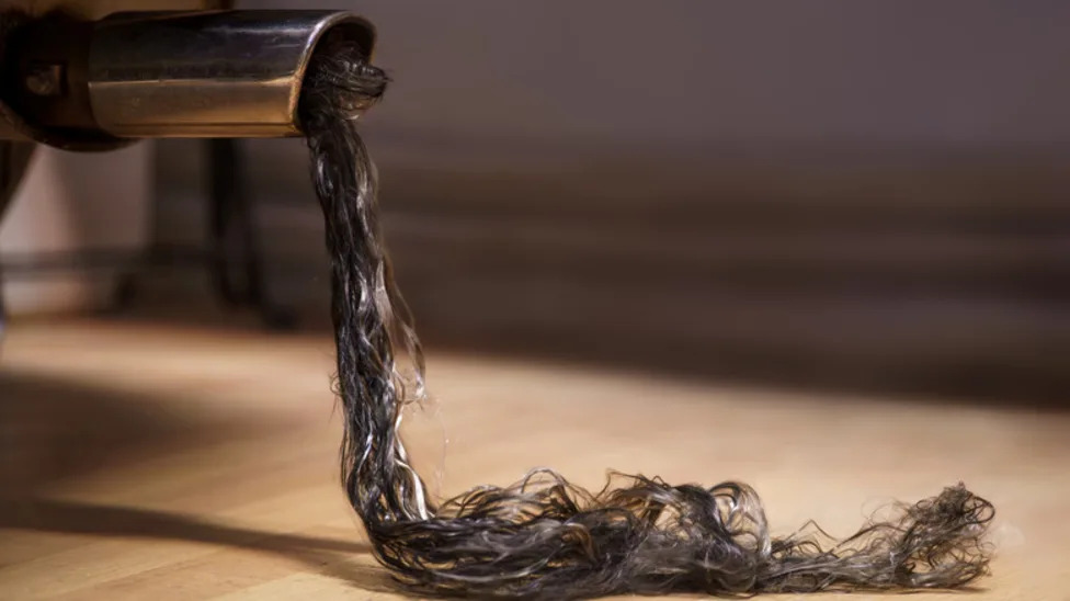 Why You Might See 'Hair' Coming Out Of Your Car's Exhaust