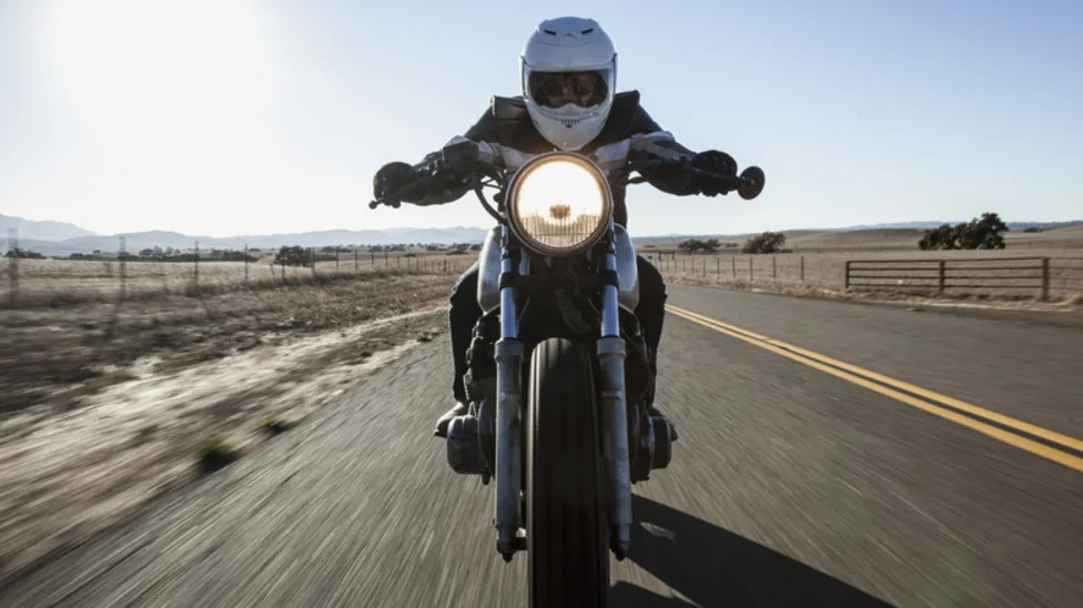 What Does It Mean If A Biker Bends Their Left Arm Down With The Palm Facing Back?