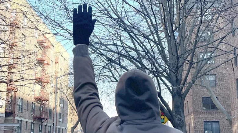 What Does It Mean When A Biker Puts Their Left Hand Up With The Palm Facing Forward?