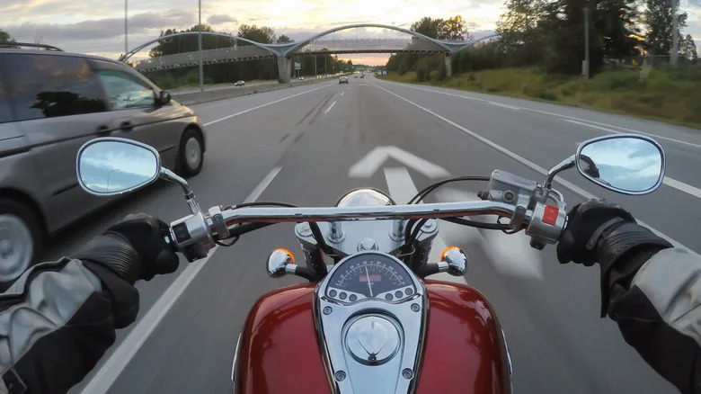 What Does It Mean When A Biker Sticks Their Leg Out?
