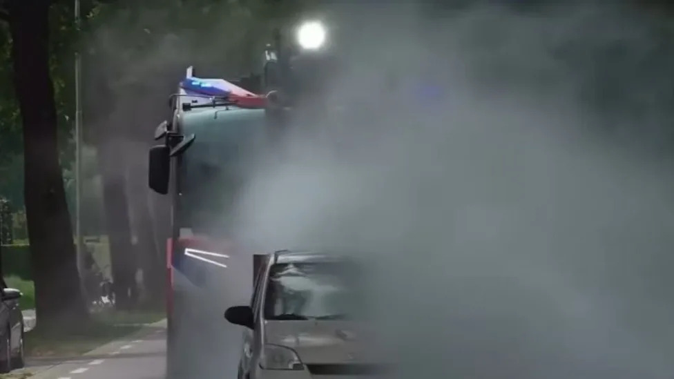 This Car Driver Being Blasted With Water From a Fire Engine Is a Reminder to Give Way to Emergency Vehicles