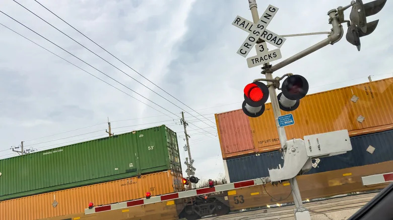 Why Railroad Crossing Signs Are X-Shaped, And What The Crossbuck Actually Means