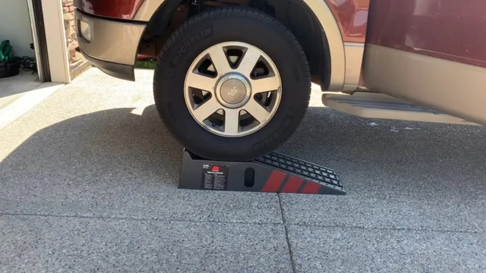Is A Jack Or Ramp Better For An At-Home Oil Change? Here's What You Need To Know
