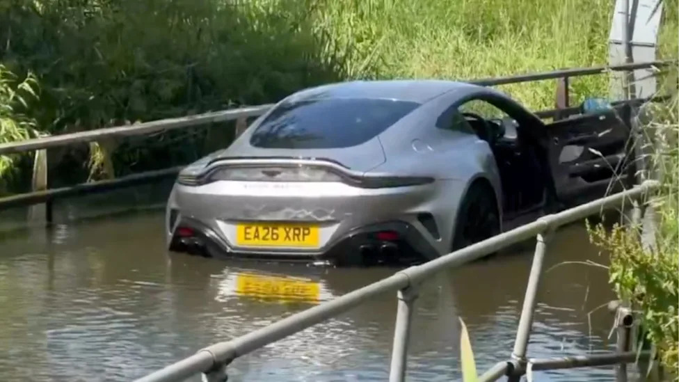 "It Didn't Look That Deep": Viral Video Shows Aston Martin Vantage Drive Right Into a Flooded Street