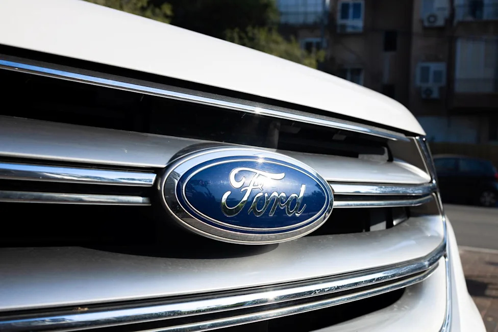 Ford's new EV pickup rolled up beside an Expedition, and it looked far smaller than expected
