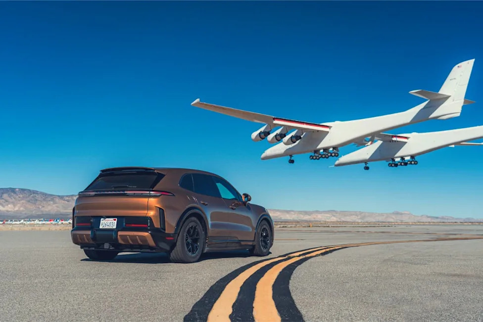 Watch a Porsche Cayenne Electric Keep Pace With the World's Largest Flying Plane