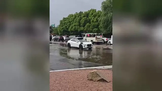 Video shows Waymo driverless vehicle stuck in 'AI loop' on flooded Phoenix street