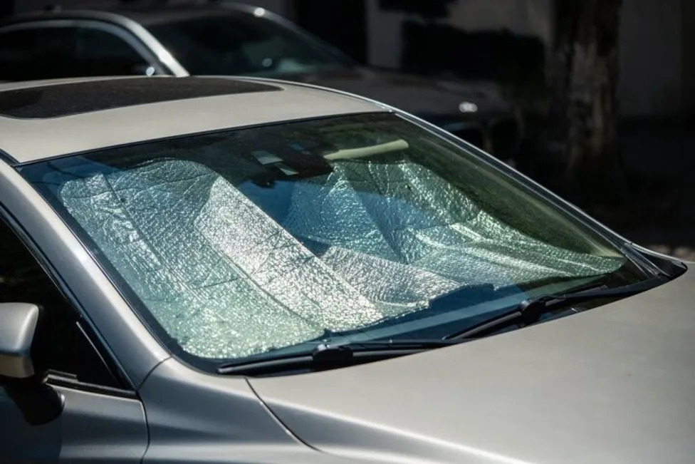 How To Keep Your Parked Car Cooler This Summer