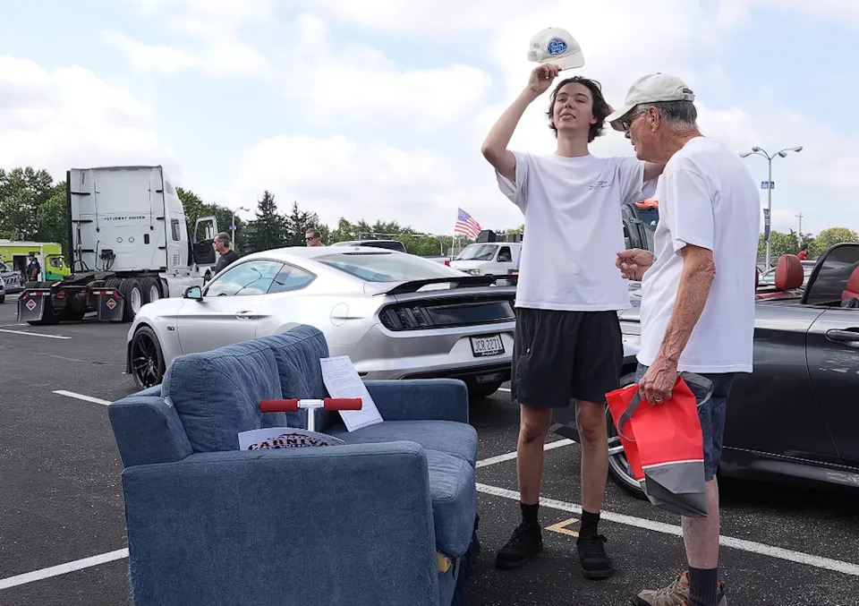 YouTuber Brings a Drivable Couch to a Car Meet, Instantly Enrages Porsche Owner