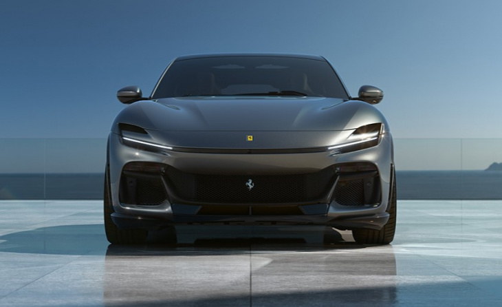 ferrari’s first suv officially unveiled with a v12 and suicide doors