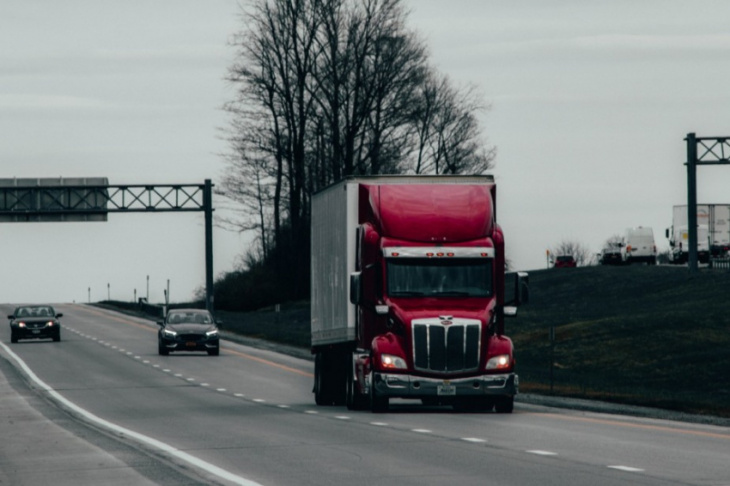 why do trucks have to stop at weigh stations?
