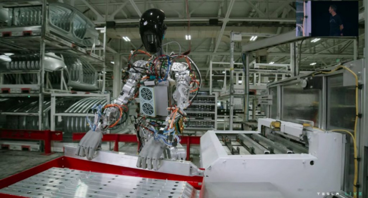 tesla shows demo video of optimus bot working in the fremont factory
