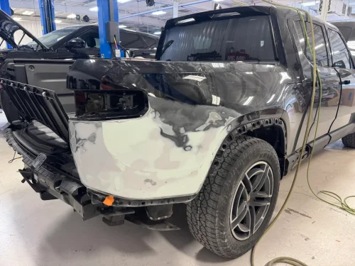 Rivian’s One-Piece Bedside Turned A Dinner-Plate Dent Into Used Corolla Money