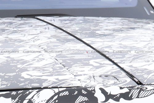 Rolls-Royce’s Electric SUV Revives A Long-Forgotten Hood Design