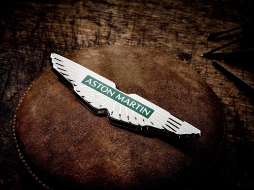 The Brand Aston Martin Is Suing Over Its Wings Badge Owns 17% Of Aston Martin