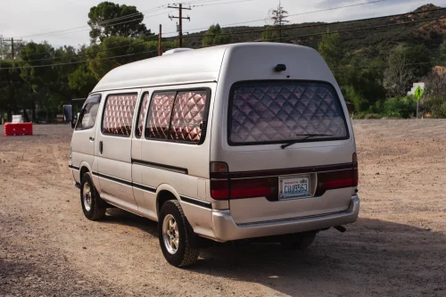 This $18K Toyota Van Hides A Private Bathroom With A Shower In The Back
