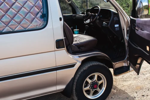 This $18K Toyota Van Hides A Private Bathroom With A Shower In The Back