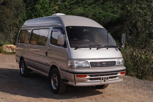 This $18K Toyota Van Hides A Private Bathroom With A Shower In The Back