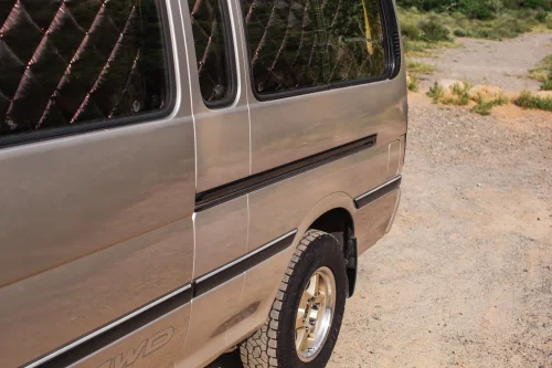 This $18K Toyota Van Hides A Private Bathroom With A Shower In The Back