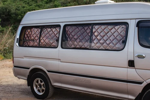 This $18K Toyota Van Hides A Private Bathroom With A Shower In The Back