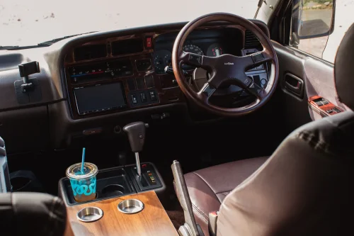 This $18K Toyota Van Hides A Private Bathroom With A Shower In The Back
