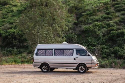 This $18K Toyota Van Hides A Private Bathroom With A Shower In The Back