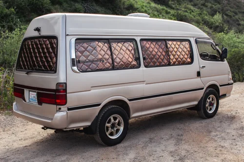 This $18K Toyota Van Hides A Private Bathroom With A Shower In The Back