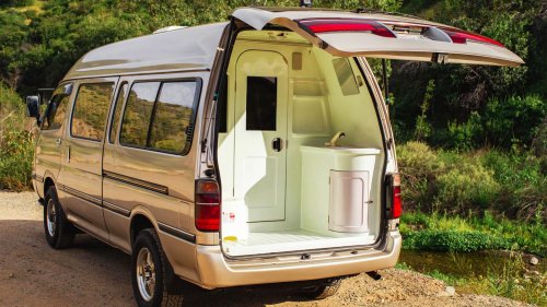 This $18K Toyota Van Hides A Private Bathroom With A Shower In The Back