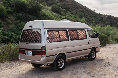 This $18K Toyota Van Hides A Private Bathroom With A Shower In The Back